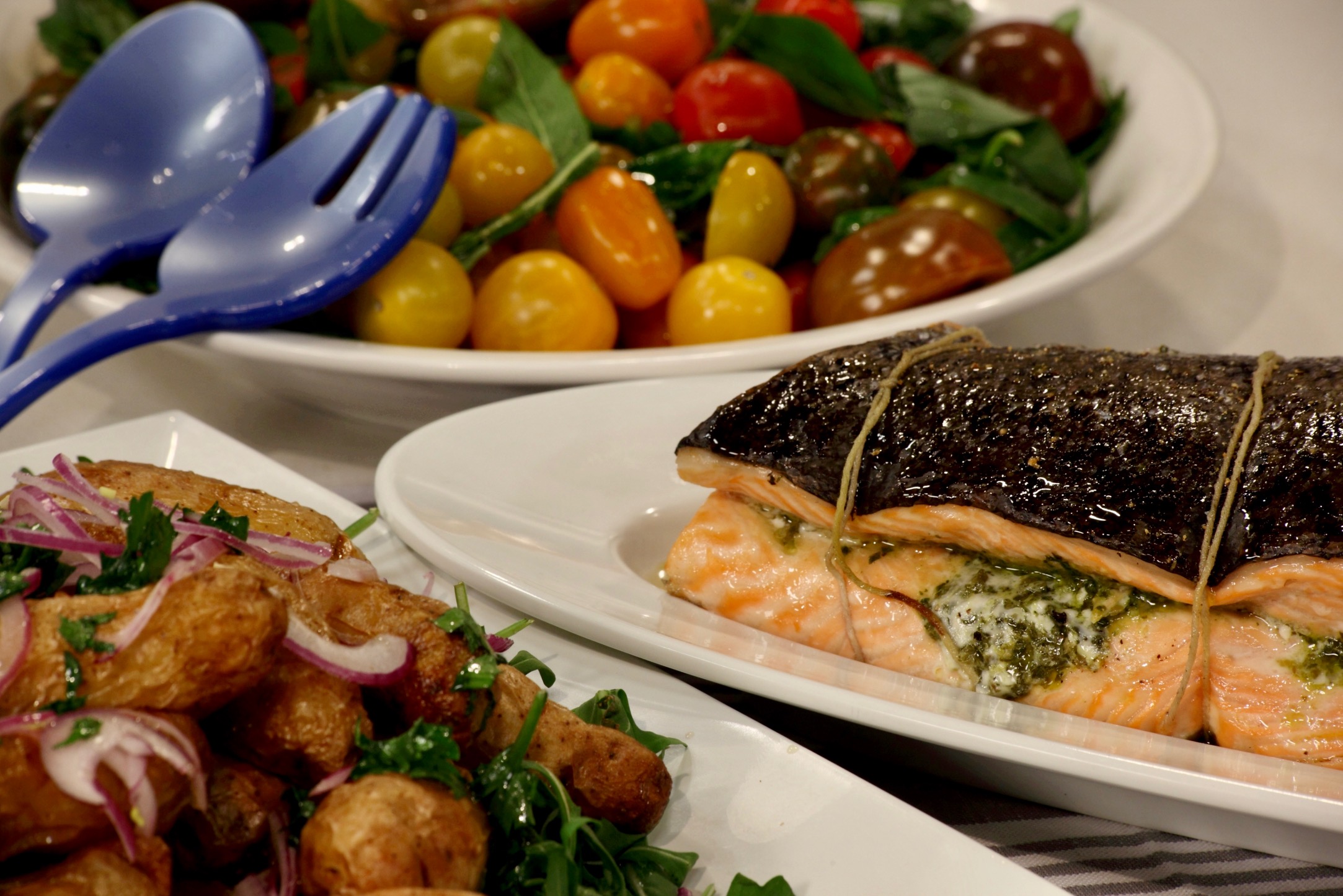 Roast Salmon Fillets with Salsa Verde, Potato and Rocket Salad and Heirloom Tomato Salad
