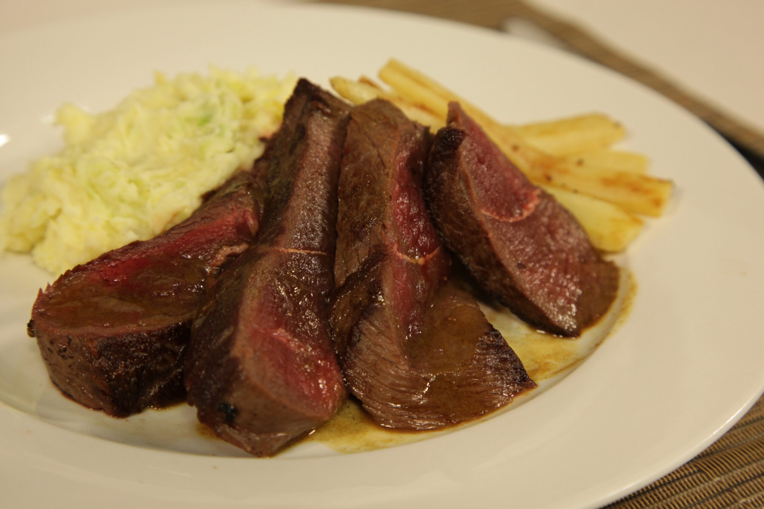 Seared Venison Loin with Liquorice Sauce and Colcannon