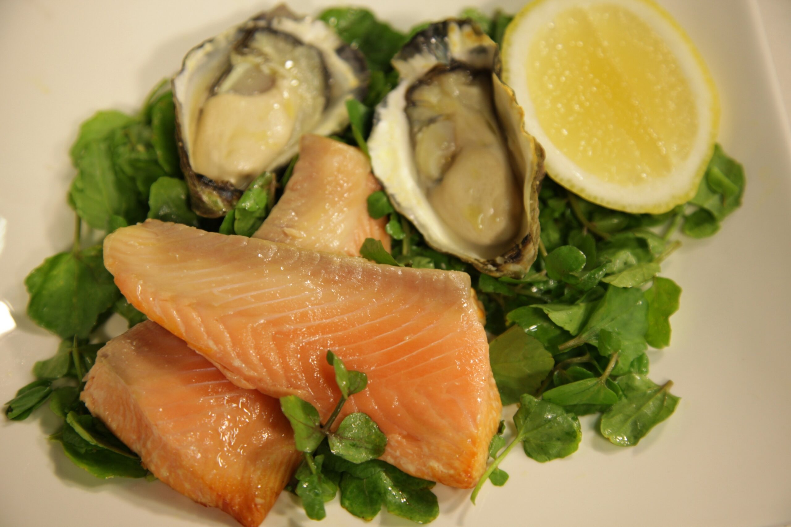 Tea-Smoked Oysters and Salmon with watercress salad