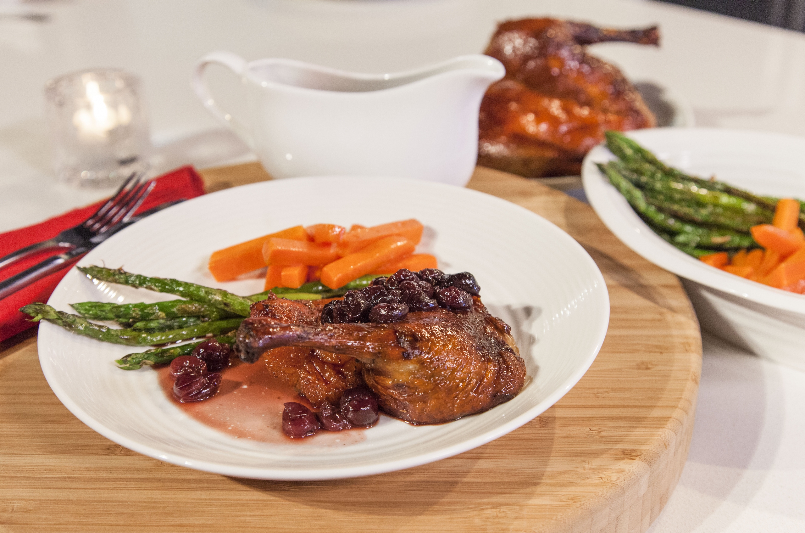 Roast Duck with Cherry Sauce, Spiced Carrots & Asparagus